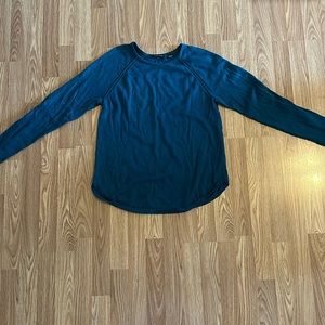 Teal sweater. Size L.